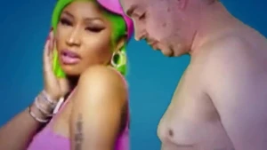 Lucky fan gets to jerk over Nicki's ass in her new music video