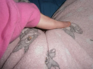 Relaxing in bed caressing my cameltoe over my pajamas :P