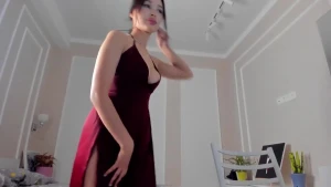 Beautiful Asian Girl In Red dress With A Sexy Round Bubble Butt