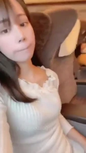 Asian girl masturbates in public on train