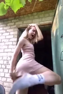 Fit blonde slut mastrubating outside in dress