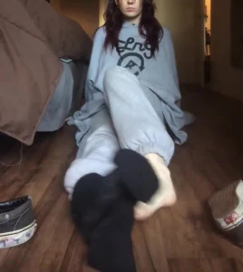 nice teen takes of her socks to show her soles