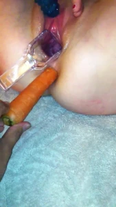 Fucking a white girls asshole with a carrot