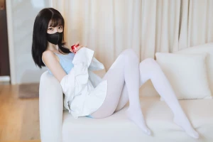 Petite cute Asian girl with white stockings 3551379