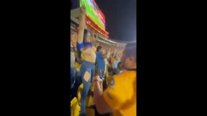 Mexican female fan Carla Garza lifting up her shirt showing her boobs in  stadium, public nudity 3612581