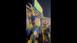 Mexican female fan Carla Garza lifting up her shirt showing her boobs in  stadium, public nudity 3612582