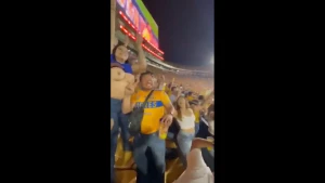 Mexican female fan Carla Garza lifting up her shirt showing her boobs in  stadium, public nudity 3612584