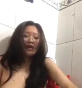 Asian slut masturbating