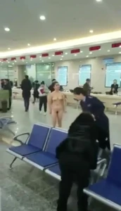 Asian naked in airport