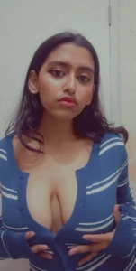 Beautiful girl showing her big boobs