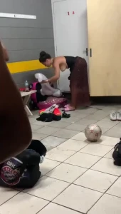 Woman changes in men's locker room / Brazil